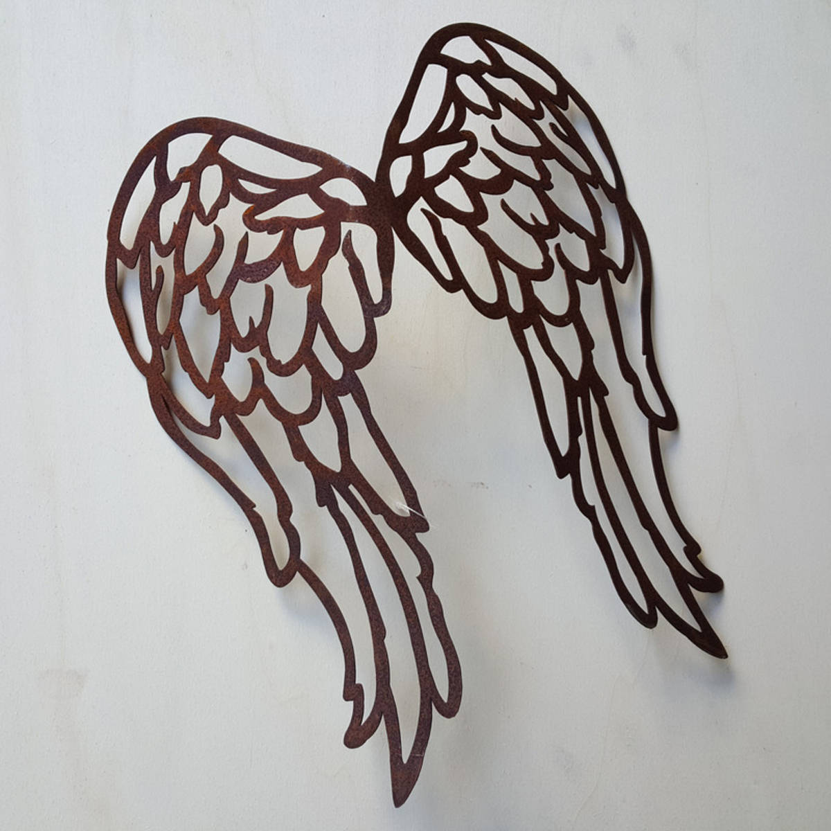 Ailes en fer rouillé, hauteur 34cm