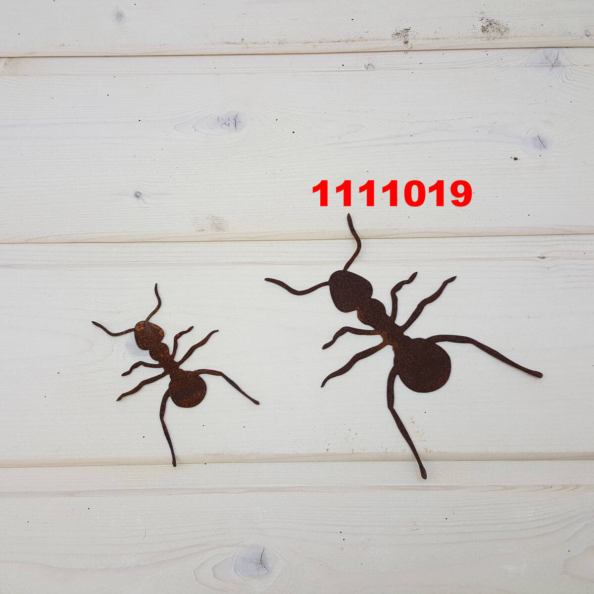 Fourmi en métal rouillé