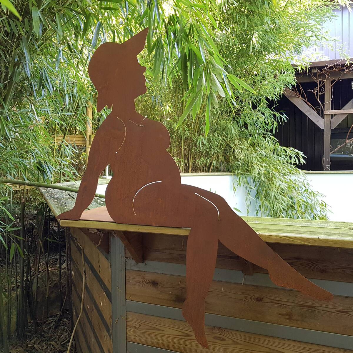 Baigneuse en fer rouillé, H.100 cm 