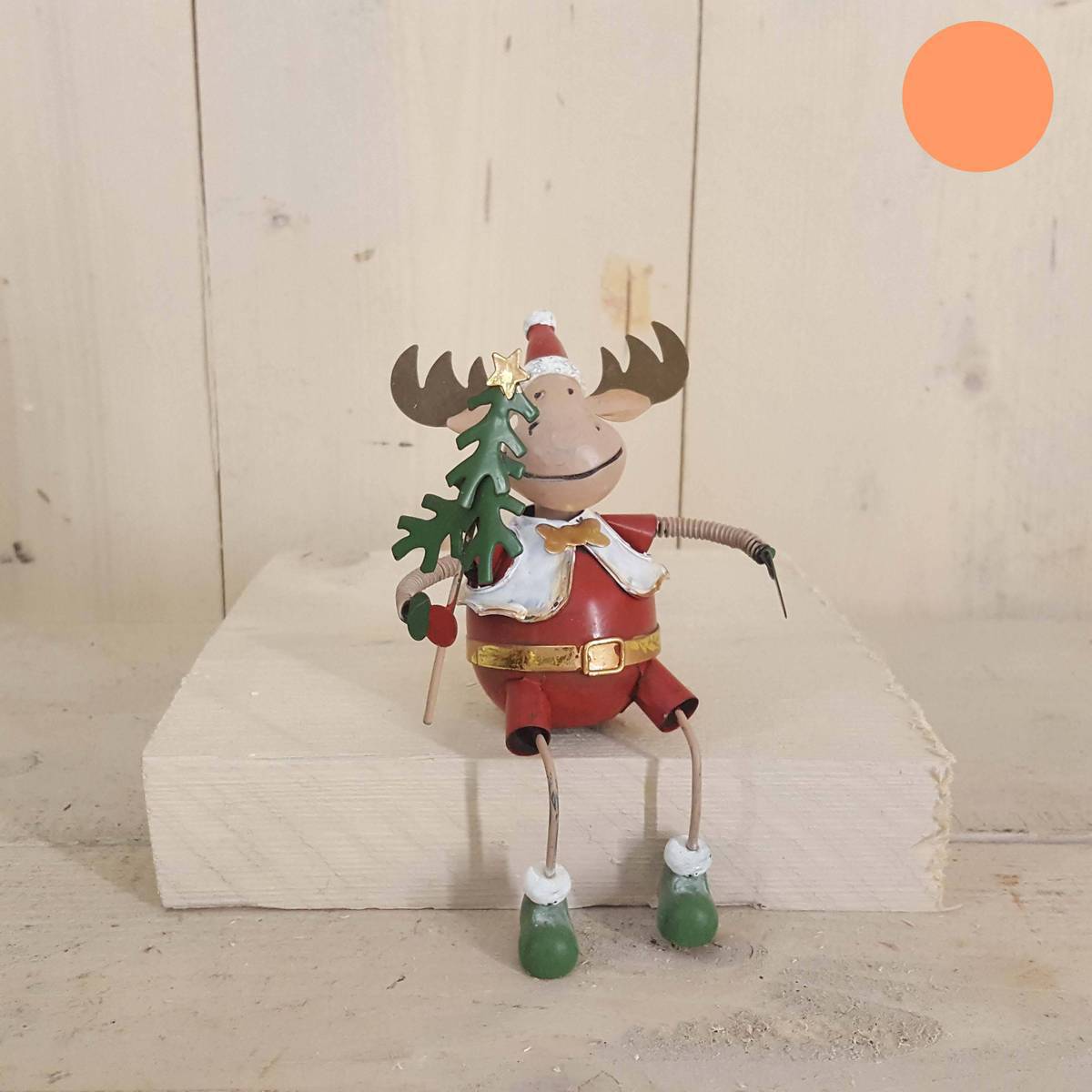 Renne en métal, assis 