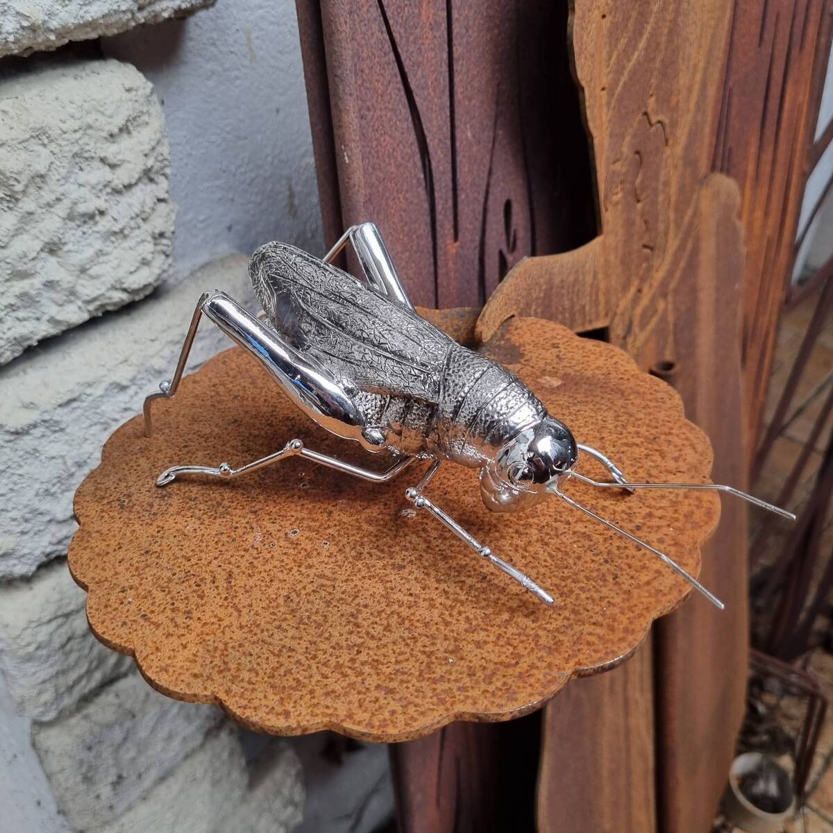 Grille aus Polyresin, silber, 22 cm 