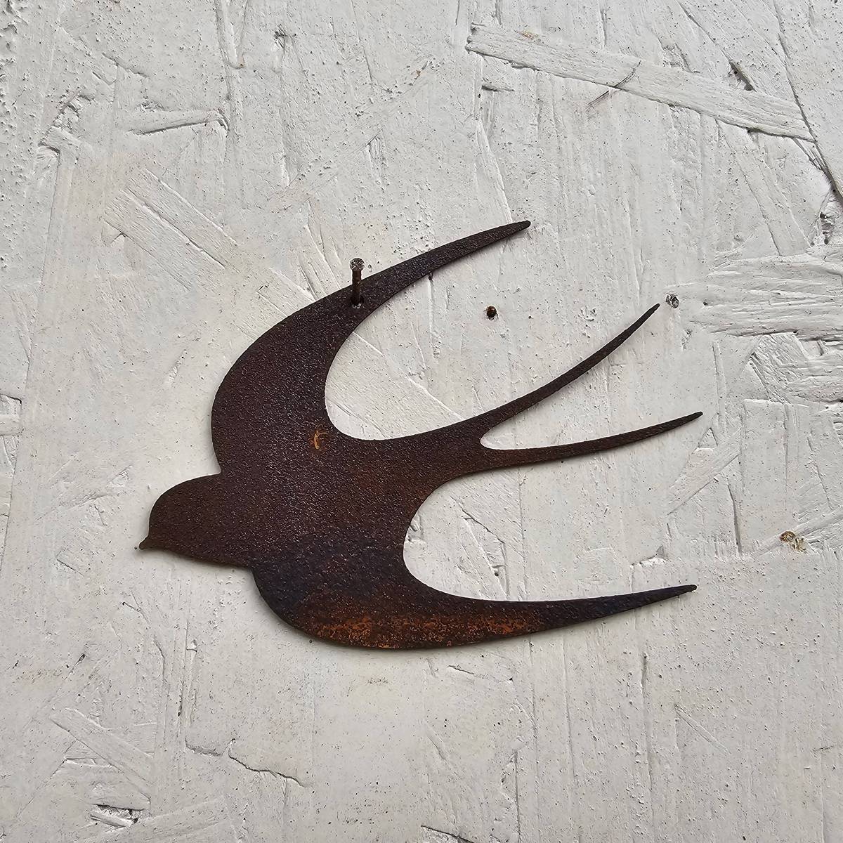 Schwalbe aus Rosteisen, zum hängen, 12 cm 